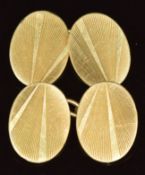 A pair of 18ct gold cufflinks with engraved decoration, maker OP, 8.8g