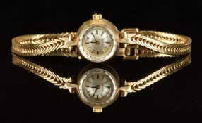 Omega 9ct gold ladies wristwatch with two-tone hands and hour markers, silver dial and signed