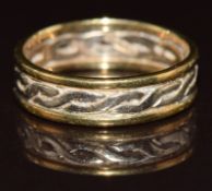 A 9ct gold bi-coloured ring with pierced Celtic design, 2.8g, size L