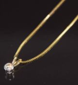 A 9ct gold pendant set with a diamond of approximately 0.15ct, on 9ct gold chain, 2.4g, 40cm