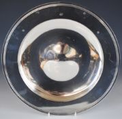 Asprey Elizabeth II millennium feature hallmarked silver charger or bowl, of plain form with