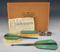 Art Deco green guilloché enamel and hallmarked silver dressing table set comprising hand mirror