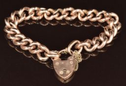 A 9ct rose gold curb link bracelet with heart padlock clasp, 22.4g, 20cm