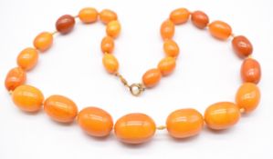 Baltic amber necklace made up of graduated oval beads, largest 16 x 22mm, smallest 9 x 13mm, 42g