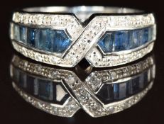 An 18k white gold ring set with sapphires and diamonds, 3.8g, size N