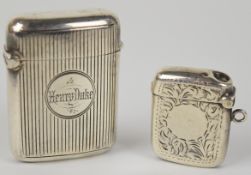 Two hallmarked silver vesta cases comprising a George Unite Victorian example with reeded