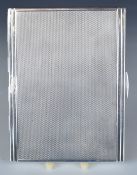 Art Deco hallmarked silver cigarette case with engine turned and stepped decoration and gilt