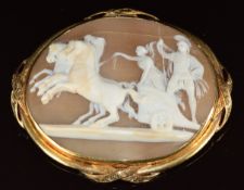 Victorian brooch set with a cameo depicting horses and cart with a warrior and lady, 17.2g, 6 x 5cm