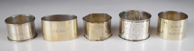 Five hallmarked and other silver napkin rings including a Chinese example, weight of all five 193g