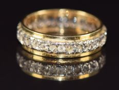 An 18ct gold eternity ring set with spinel, 3.5g, size J