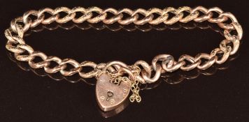 A 9ct rose gold curb link bracelet with heart padlock clasp, 8.9g, 18cm