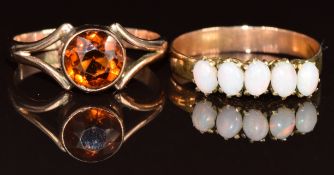 Two 9ct gold rings, one set with five opals and the other a round cut citrine, 4g, size P