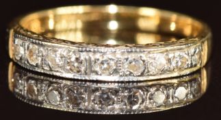 An 18ct gold half eternity ring set with diamonds, 2.5g, size K