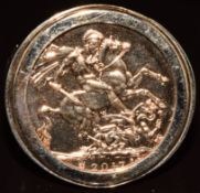 A 9ct gold ring set with a 2017 gold full sovereign, 18g, size Z