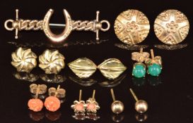 Edwardian 9ct rose gold brooch in the form of a horseshoe and seven pairs of 9ct gold earrings