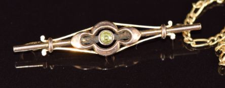 A 9ct gold necklace with T bar (3.7g, 46cm) and 9ct gold brooch (1.5g)