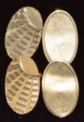 A pair of 9ct gold cufflinks with engraved sunburst design, 3.8g