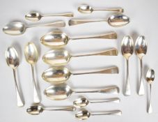 Sixteen hallmarked silver Old English pattern spoons comprising four table spoons, six dessert