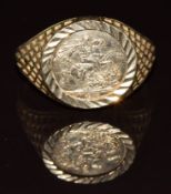 A 9ct gold ring set with a miniature faux sovereign, 1.7g, size L
