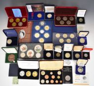 Large collection of cased collectible coins including silver, limited editions, Victoria Cross