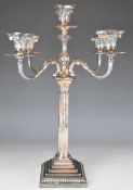 19th or early 20th century silver plated five branch candelabra, of Corinthian column form, height