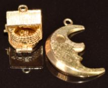 A 9ct gold charm by Nuno in the form of a wishing well opening to reveal a pixie and another 9ct