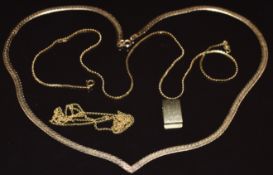 A 9ct gold ribbon necklace, two 9ct gold chains and a yellow metal clasp, 13g