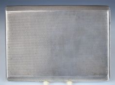 Art Deco hallmarked silver cigarette case with slide to open mechanism, engine turned decoration and