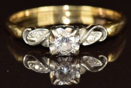 An 18ct gold ring set with a diamond of approximately 0.18ct in a platinum setting, 2.9g, size T