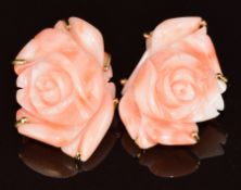 A pair of 18ct gold earrings each set with a carved coral flower, 17.2g,
