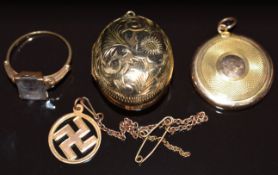 A 9ct gold c1920 locket with engine turned decoration, 9ct gold locket with engraved floral
