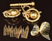 Seven 14ct gold pen nibs (1.6g), Victorian propelling pencil, 9ct gold brooch (1.9g) and yellow
