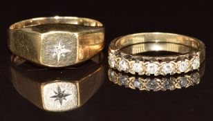 A 9ct gold half eternity ring set with diamonds and a 9ct gold ring set with a diamond in a star