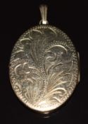 A 9ct gold locket with engraved foliate decoration, 10.3g, 3 x 4cm
