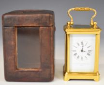 The Sheffield Goldsmiths Company brass cased miniature carriage clock with white enamel dial also