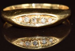 An 18ct gold ring set with a five diamonds, Birmingham 1919, 2.2g, size N