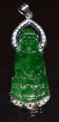 An 18k white gold pendant set with a jadeite carving and diamonds, 5.3g, 4cm