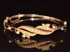 Edwardian 15ct gold bangle set with seed pearls and split pearls, 11.5g, 5.6 x 4.6cm
