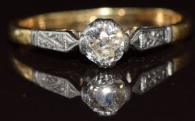 An 18ct gold ring set with a round cut diamond of approximately 0.27ct in a platinum setting, 2g,