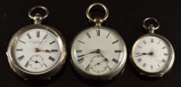 Three hallmarked silver open faced pocket watches including John Hamilton & Co of London, largest