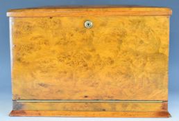 Twin handled walnut stationery box with leather inset writing slope, fitted interior, perpetual