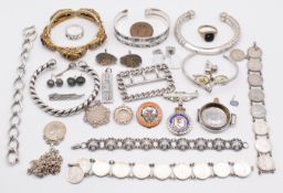 A collection of silver including Chinese filigree bracelet set with tiger's eye, four bangles,