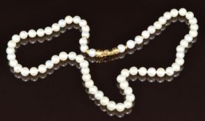 A single strand of cultured pearls with 18k gold clasp