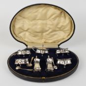 J W Benson Ltd George V hallmarked silver cruet set comprising four open salts, two peppers and