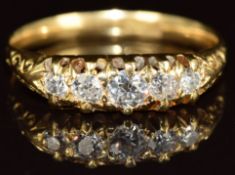 A c1920 18ct gold ring set with five diamonds, 3g, size O