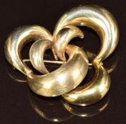 A 9ct gold brooch made up of crescent shapes, 11.9g, 4cm