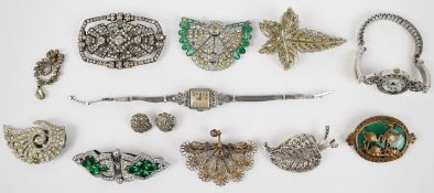 A collection of jewellery including brooches, one Art Deco set with paste, another metamorphic Art