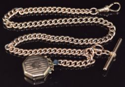 A 9ct rose gold Albert / watch chain (33.2g, 38cm) with a 9ct gold back and front locket with engine
