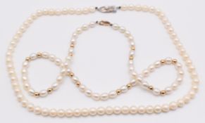 A single strand of cultured pearls with 9ct gold beads and clasp (44cm) and another single strand of
