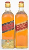 Two bottles of Johnnie Walker Red Label Extra Special Old Scotch Whisky, 26⅔ fl oz 70 proof.